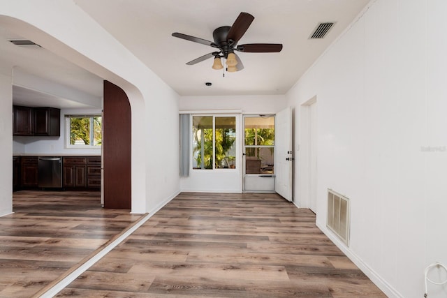 corridor featuring hardwood / wood-style floors