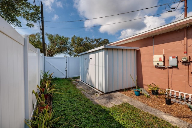 view of outdoor structure featuring a yard