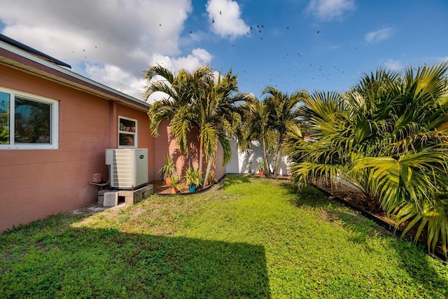 view of yard featuring central AC unit