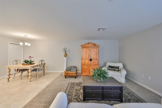 living room featuring a chandelier