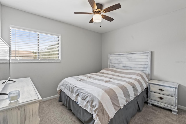 bedroom featuring ceiling fan and light colored carpet