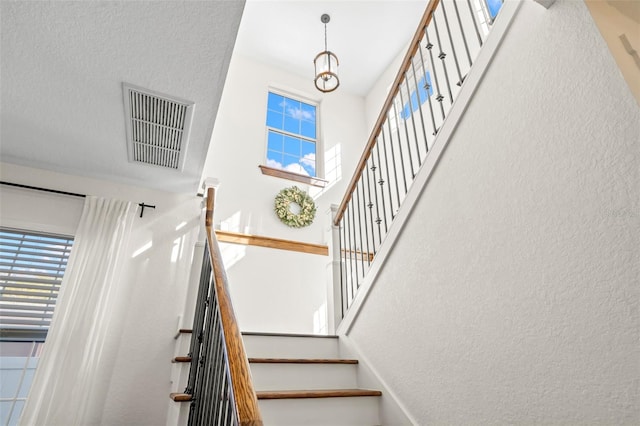 stairway with a high ceiling