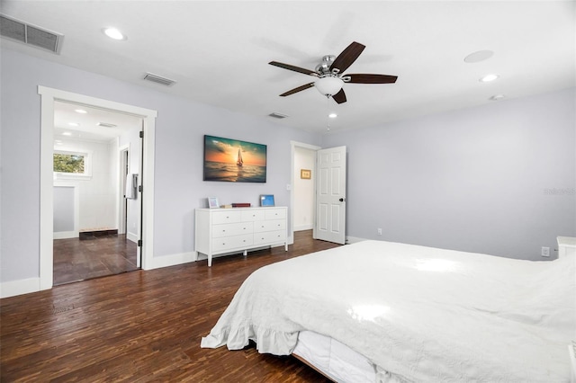 bedroom with ceiling fan and dark hardwood / wood-style flooring