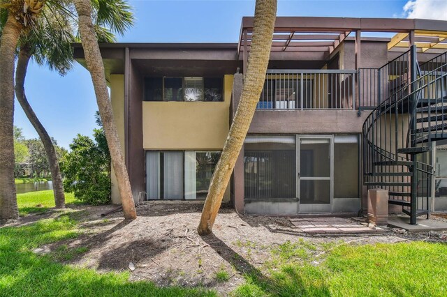 880 S Village Lake Dr N Unit 106, Saint Petersburg, FL 33716 - view of rear view of property