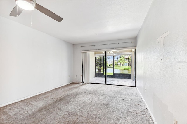 880 S Village Lake Dr N Unit 106, Saint Petersburg, FL 33716 - carpeted empty room with ceiling fan
