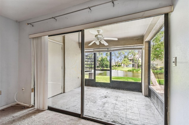 880 S Village Lake Dr N Unit 106, Saint Petersburg, FL 33716 - unfurnished sunroom featuring a water view and ceiling fan