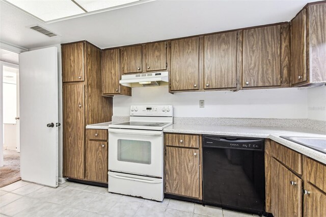 880 S Village Lake Dr N Unit 106, Saint Petersburg, FL 33716 - kitchen with light tile patterned floors, sink, black dishwasher, and white electric range oven