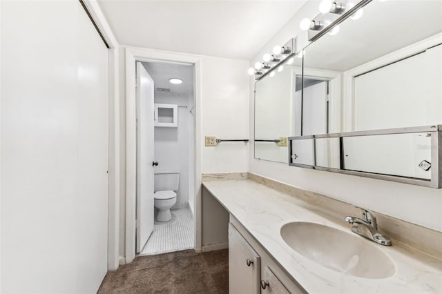 880 S Village Lake Dr N Unit 106, Saint Petersburg, FL 33716 - bathroom with toilet and vanity