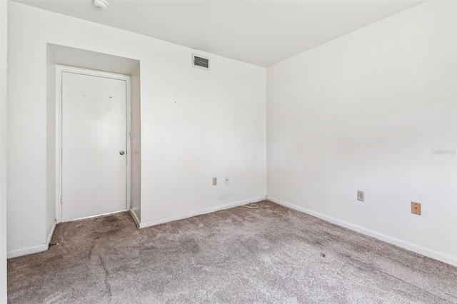 880 S Village Lake Dr N Unit 106, Saint Petersburg, FL 33716 - spare room featuring light colored carpet