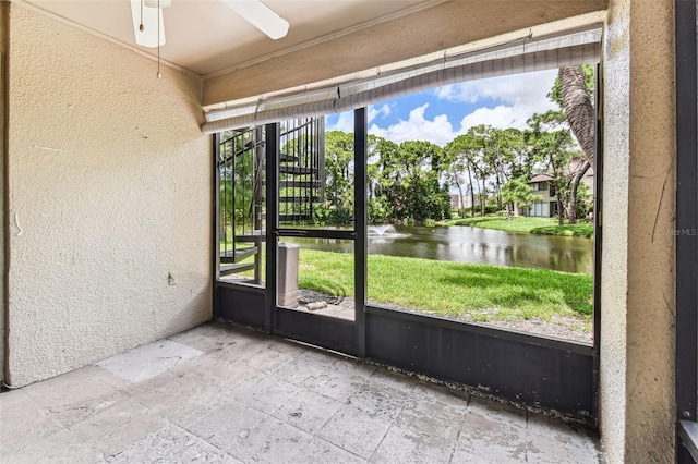 880 S Village Lake Dr N Unit 106, Saint Petersburg, FL 33716 - unfurnished sunroom featuring a water view and ceiling fan
