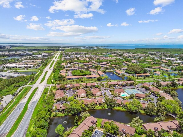 880 S Village Lake Dr N Unit 106, Saint Petersburg, FL 33716 - birds eye view of property featuring a water view