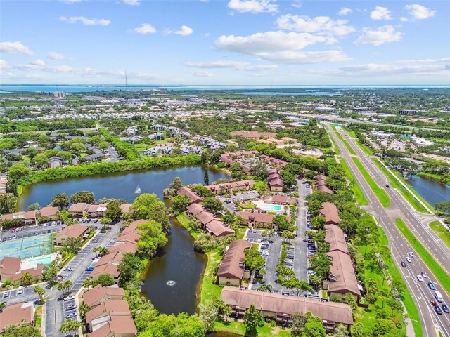 880 S Village Lake Dr N Unit 106, Saint Petersburg, FL 33716 - drone / aerial view featuring a water view