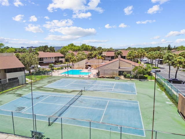 880 S Village Lake Dr N Unit 106, Saint Petersburg, FL 33716 - view of sport court featuring a community pool