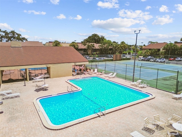 880 S Village Lake Dr N Unit 106, Saint Petersburg, FL 33716 - view of pool featuring tennis court