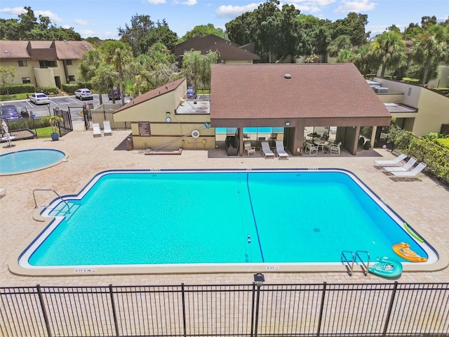 880 S Village Lake Dr N Unit 106, Saint Petersburg, FL 33716 - view of pool with a gazebo and a patio area