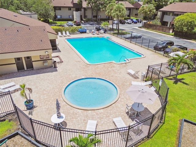 880 S Village Lake Dr N Unit 106, Saint Petersburg, FL 33716 - view of pool with a patio