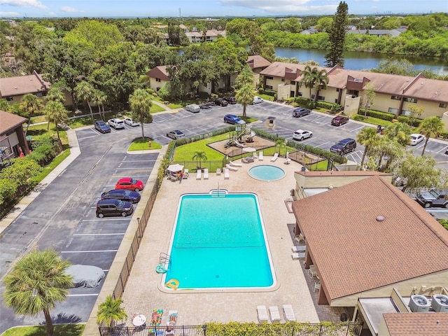 880 S Village Lake Dr N Unit 106, Saint Petersburg, FL 33716 - drone / aerial view featuring a water view
