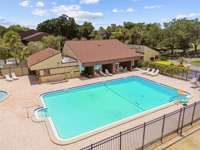 880 S Village Lake Dr N Unit 106, Saint Petersburg, FL 33716 - view of pool featuring a patio