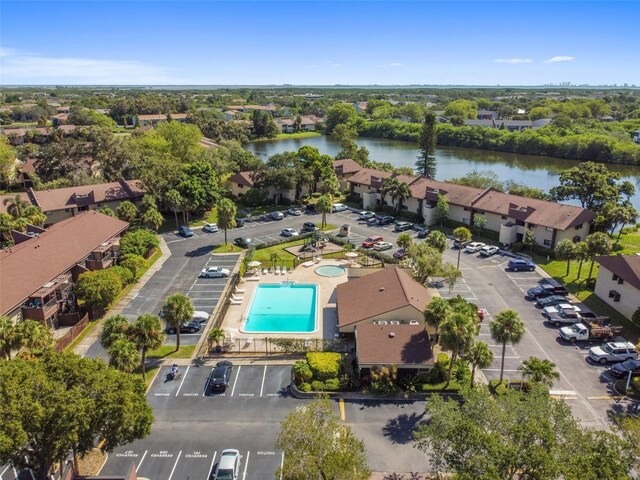 880 S Village Lake Dr N Unit 106, Saint Petersburg, FL 33716 - drone / aerial view with a water view