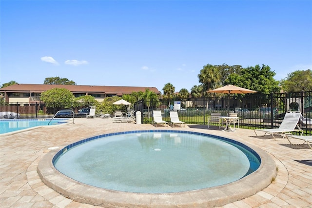 880 S Village Lake Dr N Unit 106, Saint Petersburg, FL 33716 - view of pool featuring a patio area