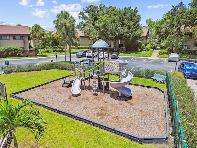 880 S Village Lake Dr N Unit 106, Saint Petersburg, FL 33716 - view of jungle gym with a lawn