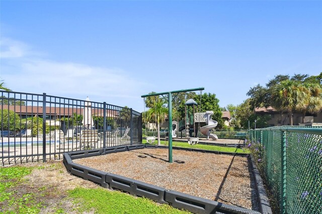 880 S Village Lake Dr N Unit 106, Saint Petersburg, FL 33716 - view of jungle gym featuring central air condition unit