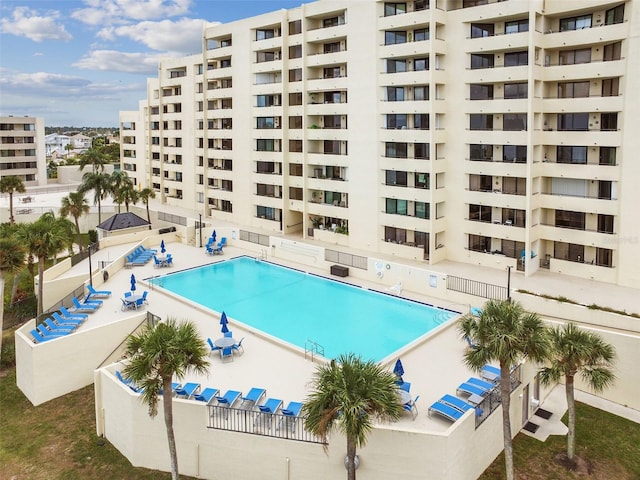 view of swimming pool featuring a patio area