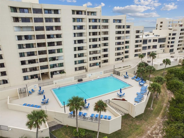 view of swimming pool with a patio area