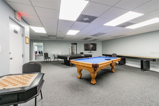 game room featuring a paneled ceiling and carpet floors