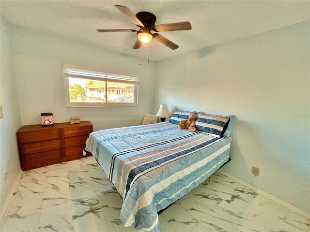 bedroom featuring ceiling fan