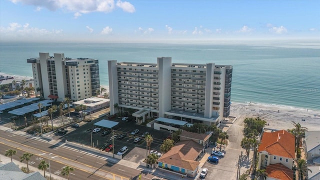 bird's eye view with a water view and a view of the beach