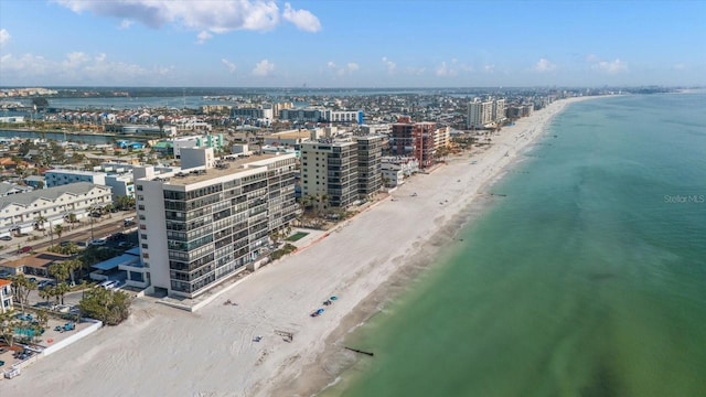 aerial view featuring a view of the beach and a water view