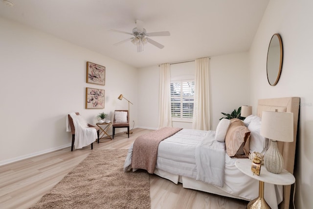 bedroom featuring ceiling fan and light wood-type flooring