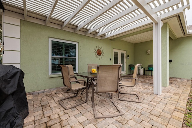 view of patio / terrace featuring a pergola and french doors