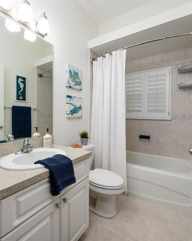 full bathroom with shower / bath combination with curtain, vanity, toilet, and tile patterned flooring