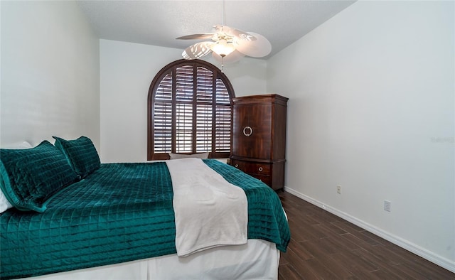 bedroom featuring dark wood-type flooring and ceiling fan