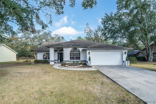 single story home featuring a garage and a front yard