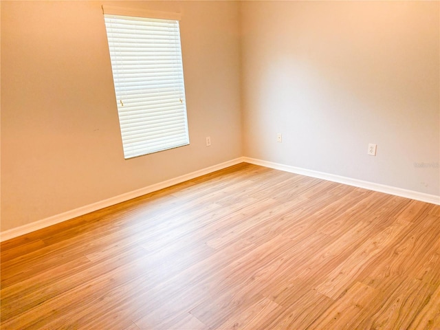 unfurnished room featuring light wood-type flooring