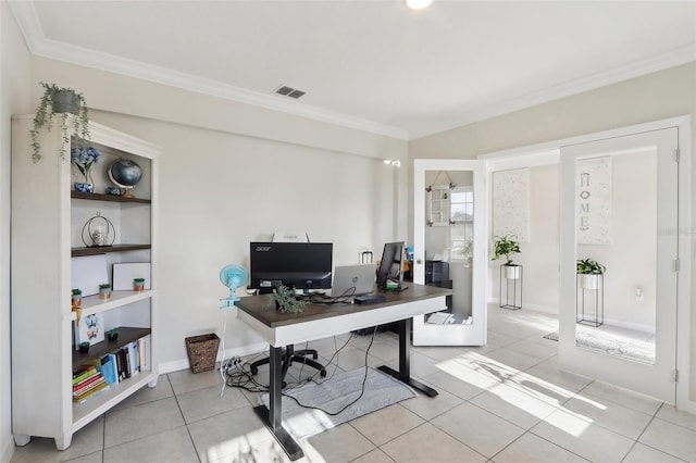 home office featuring light tile patterned floors and crown molding