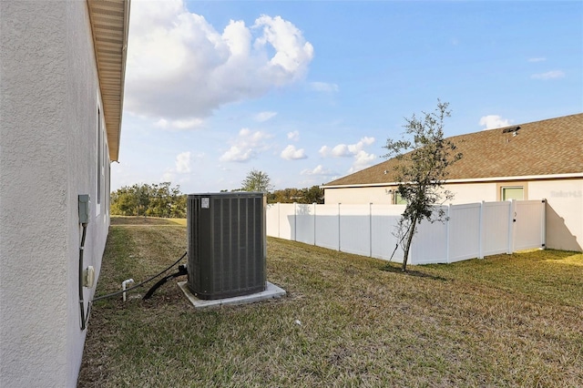 view of yard with central AC unit