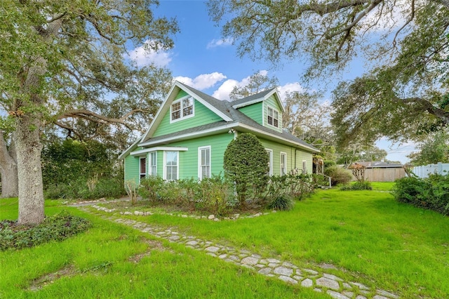 view of property exterior featuring a yard