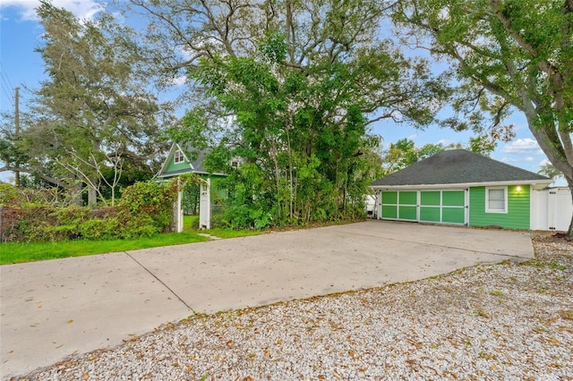 exterior space with a garage