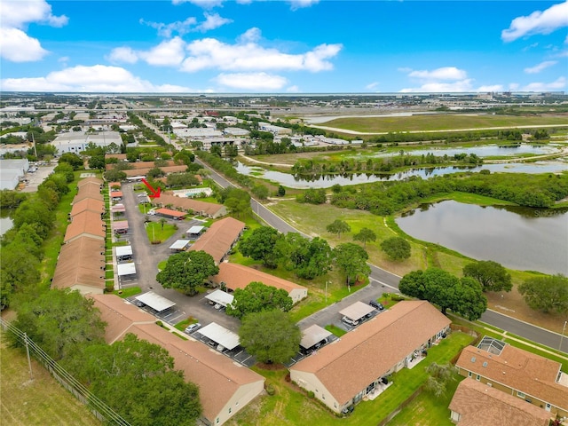 birds eye view of property featuring a water view