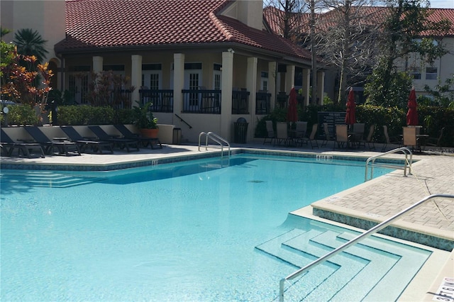 view of pool with a patio