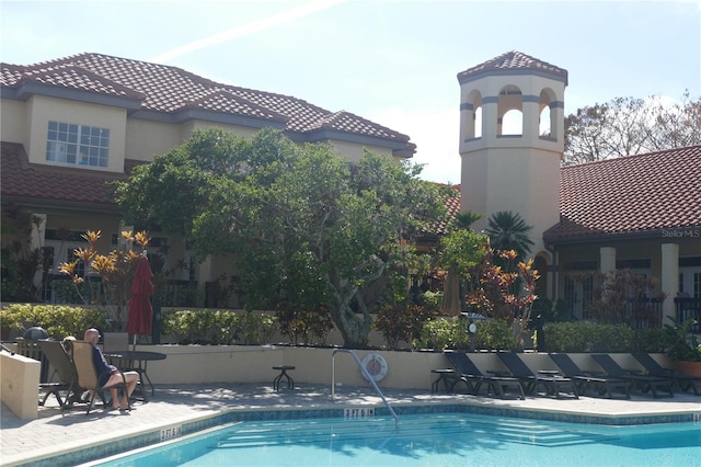 view of pool with a patio