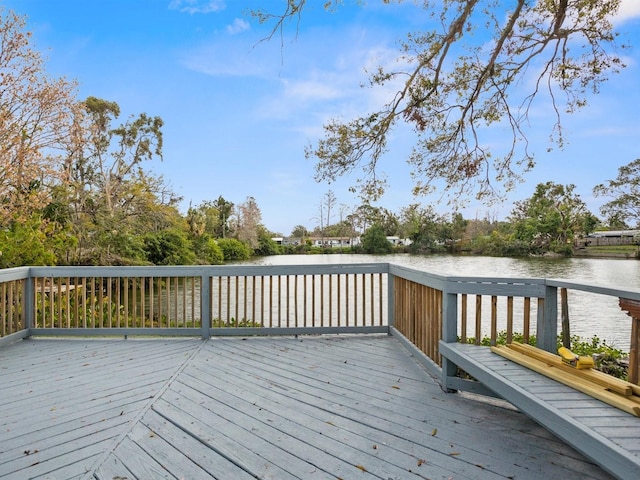 wooden terrace with a water view