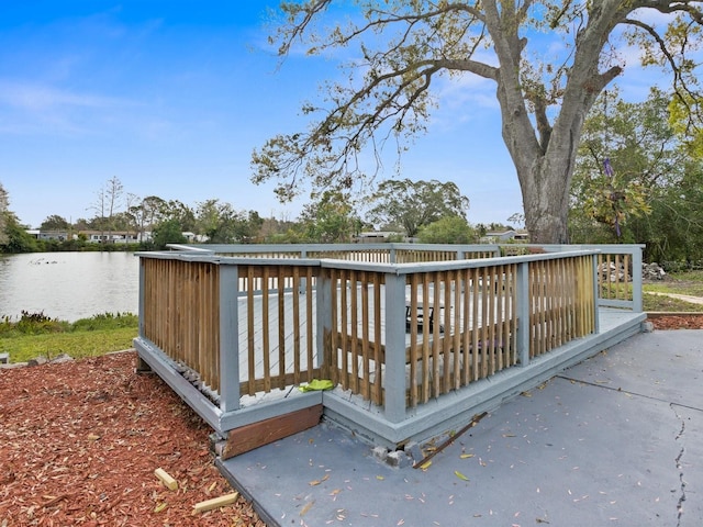 wooden deck with a water view