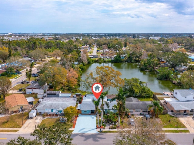 drone / aerial view featuring a residential view and a water view