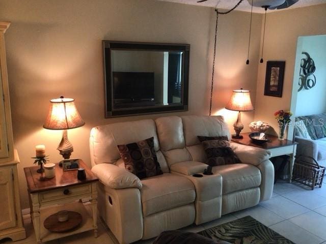 living room featuring light tile patterned floors