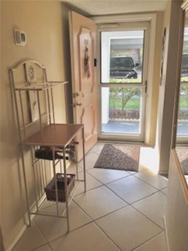 doorway featuring tile patterned floors